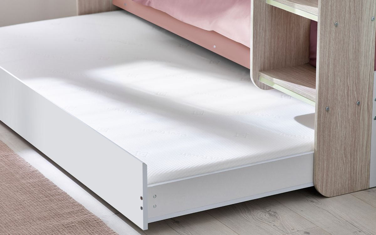 Pastel Pink Bunk Bed with Pull-Out Trundle and Shelving